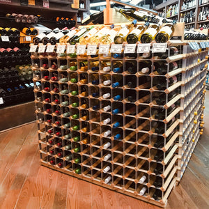 Custom KM retail wine rack with bottle raiser displays by Kedco Wine 