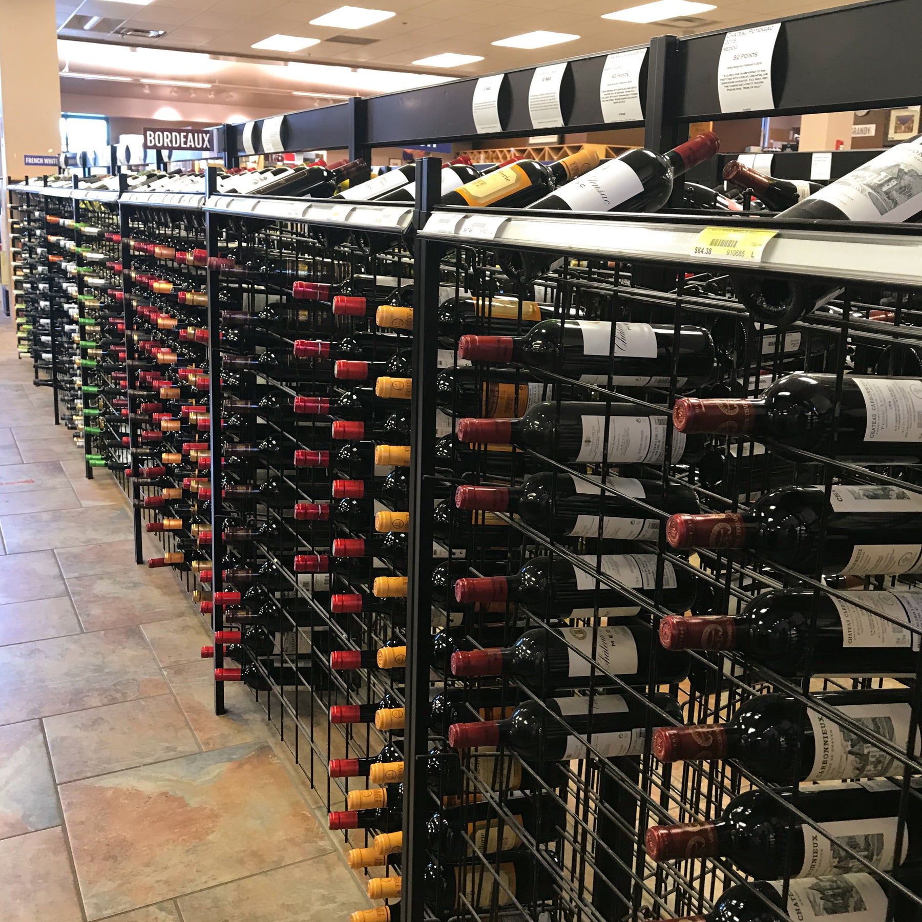 Kedco Black Steel wine racks for retail wine and liquor stores.